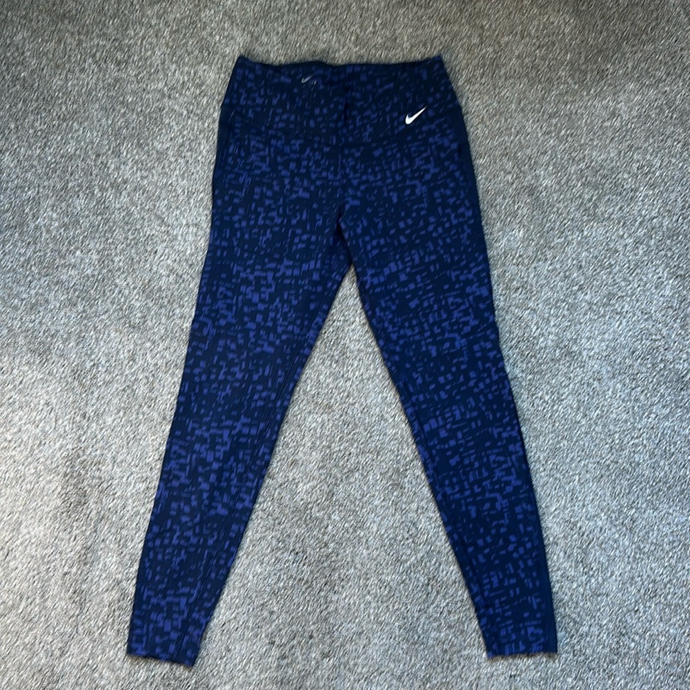 Medium Nike blueish purple leggings.